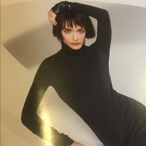 Wolford pull over turtle neck  with shimmery  cuff